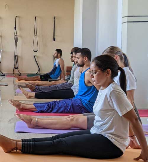 Receiving postural adjustments in yoga classes – Shanta Yoga